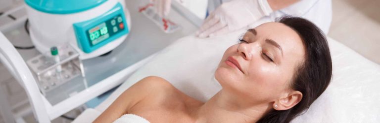 Mature womn getting facial skincare treatment PRP facial in London